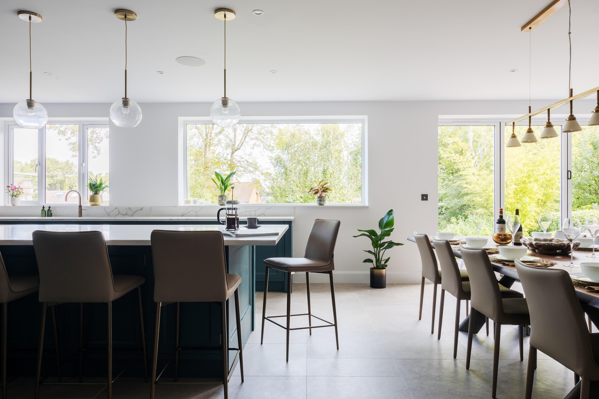 Kitchen island and dining table with chairs